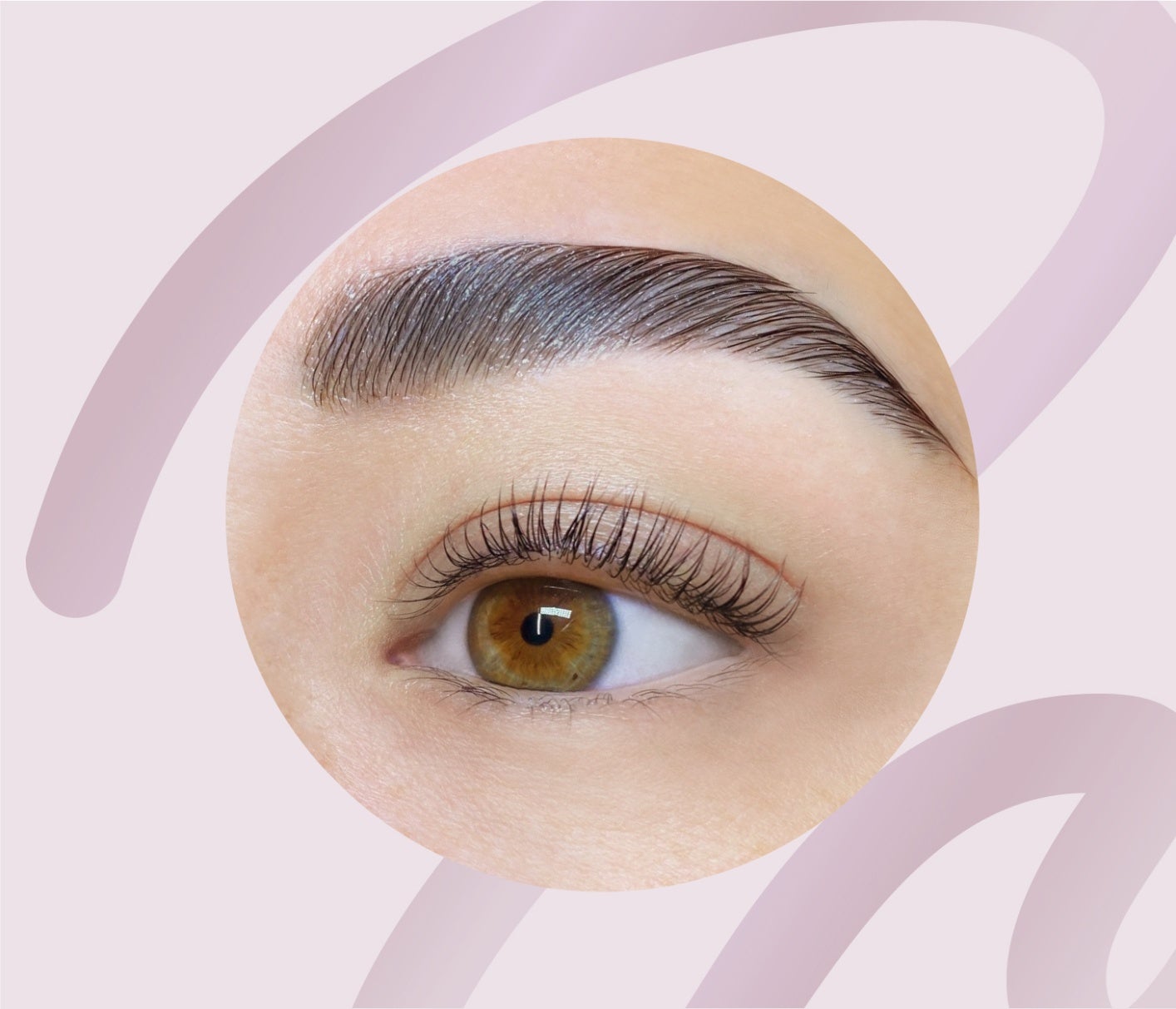 Close-up of a woman's eye showcasing perfectly laminated eyebrows, enhancing the natural beauty of the brow line.