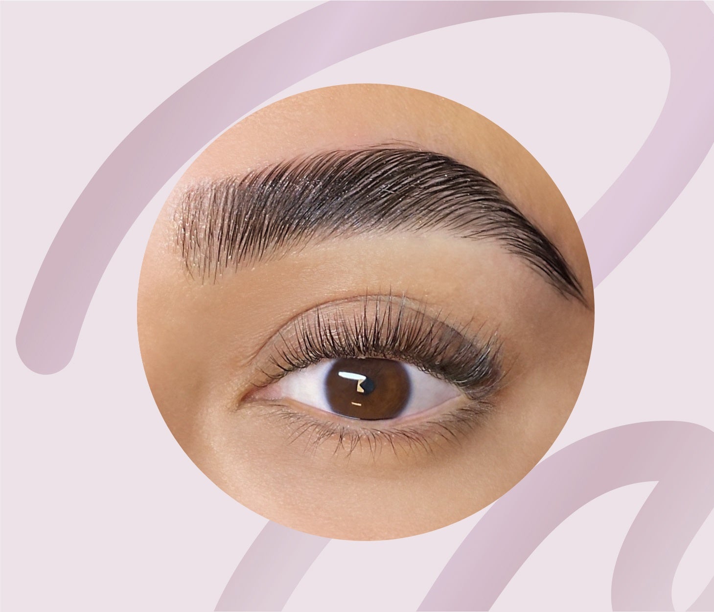 Close-up of a woman's eye with a beautifully executed lash lift at The Lash Lounge, showcasing fuller, uplifted eyelashes.
