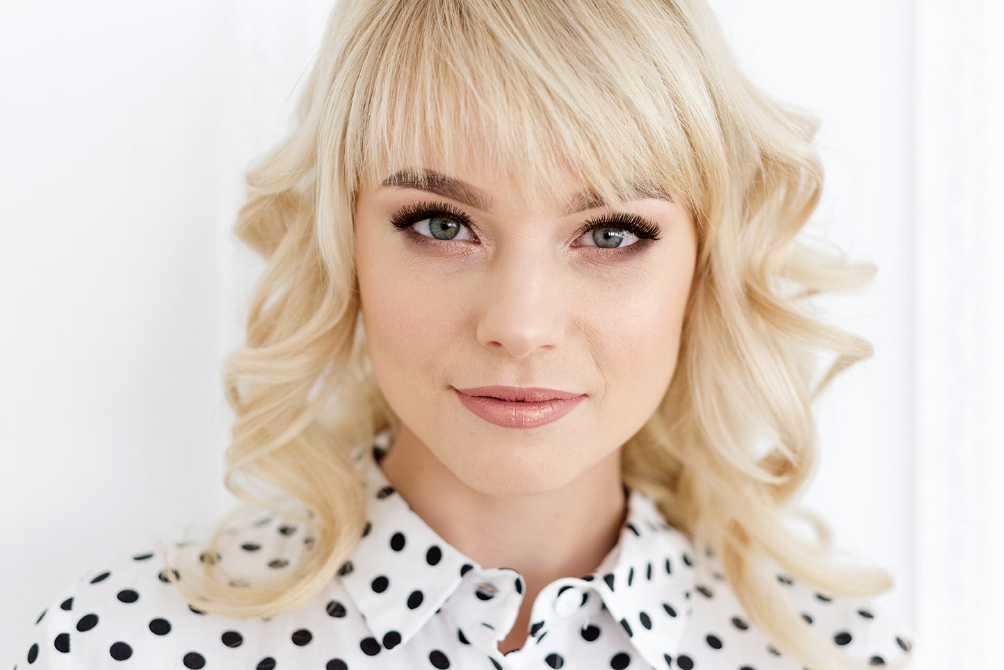 Close-up of stylish blonde woman with lash extensions