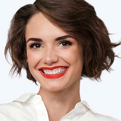 Woman smiling after receiving a Lash Lounge Service