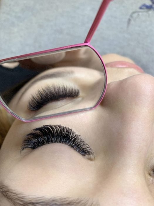 mega volume extreme eyelash extensions closeup on closed eye